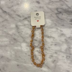 Yellow and white choker